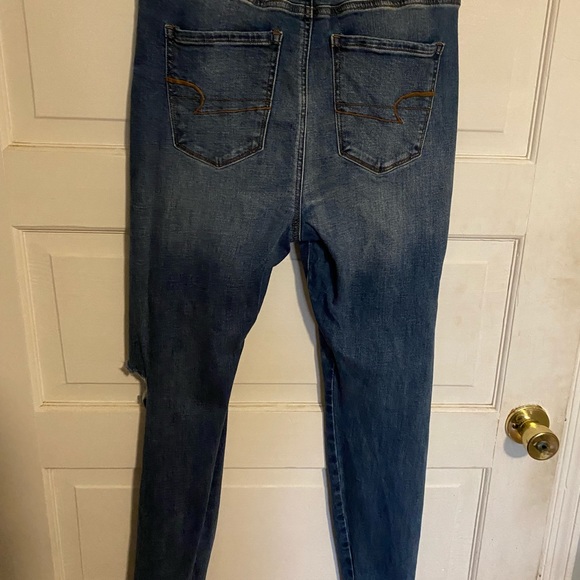 Ripped A&E skinny jeans. Size 10 - Picture 2 of 3